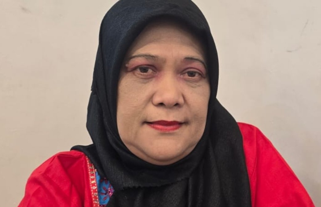 Hj. Fadlina Raya Lubis, pelapor kasus dugaan pemberian keterangan palsu di bawah sumpah,